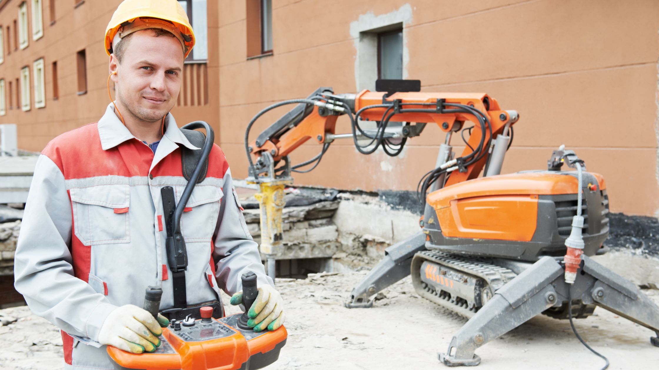 Worker Operating Demolition Machine